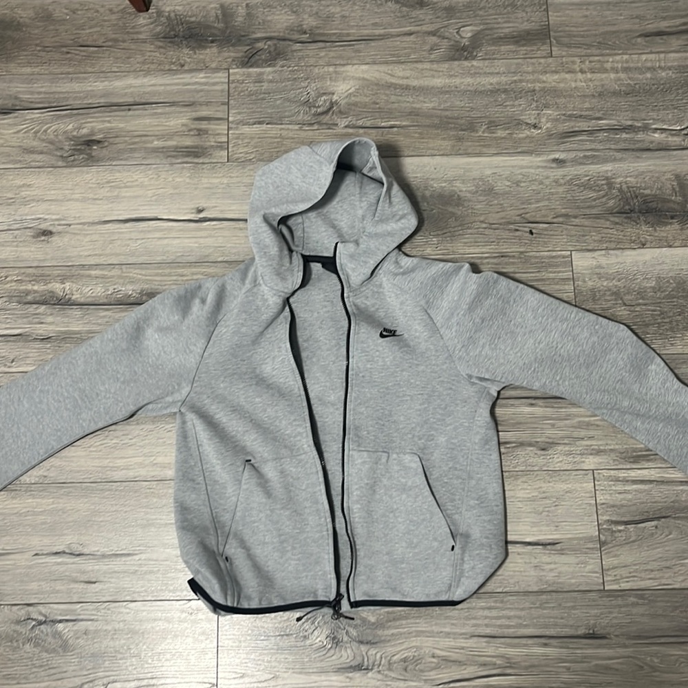 Nike Tech Jacket Gray. Size Large but fits a little smaller.